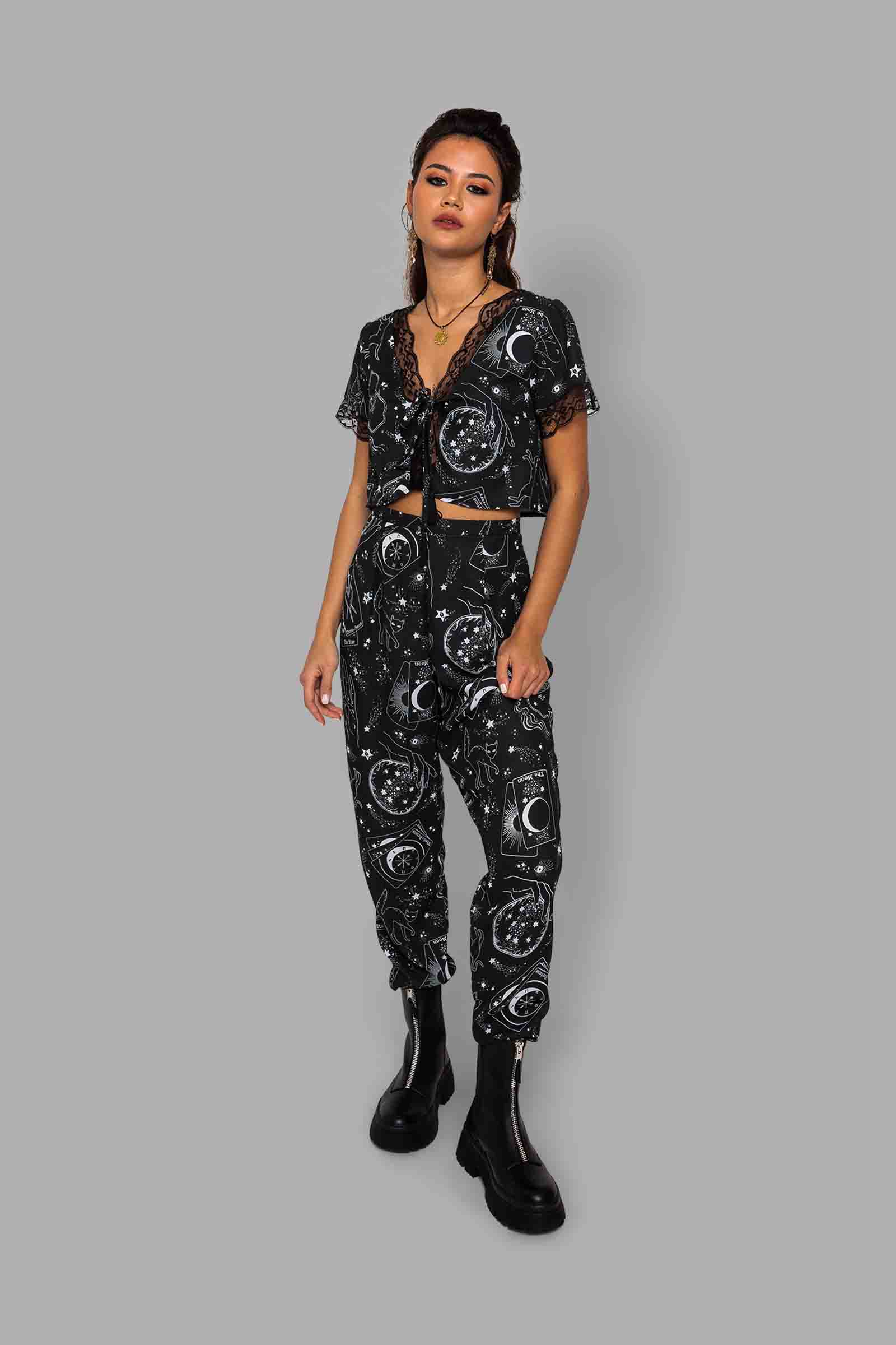 cosmic drifters high waist tapered trousers front travelling carnival