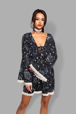 cosmic drifters lace up bell sleeve mini dress close travelling carnival
