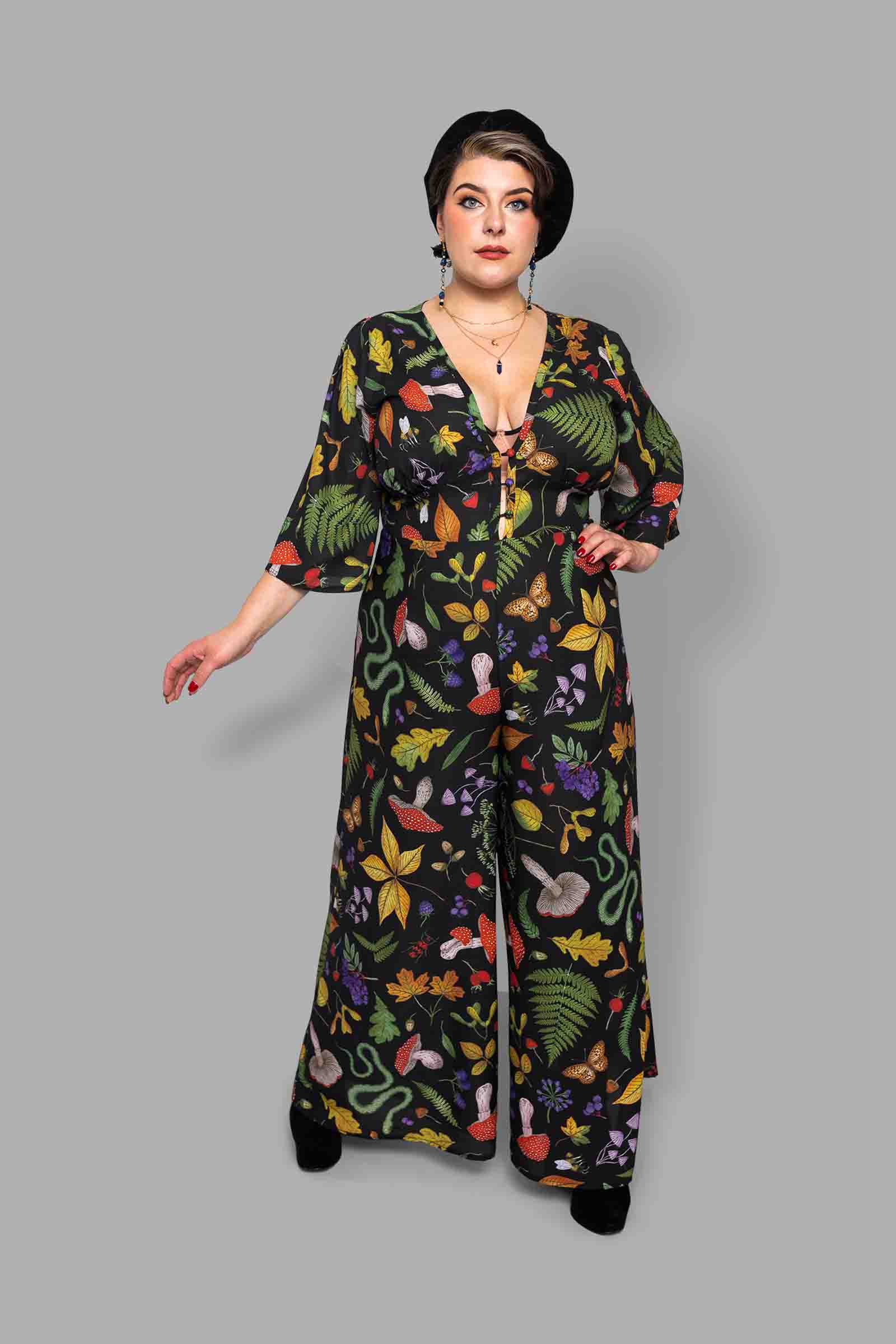 cosmic drifters plunge neck jumpsuit front hedge witch