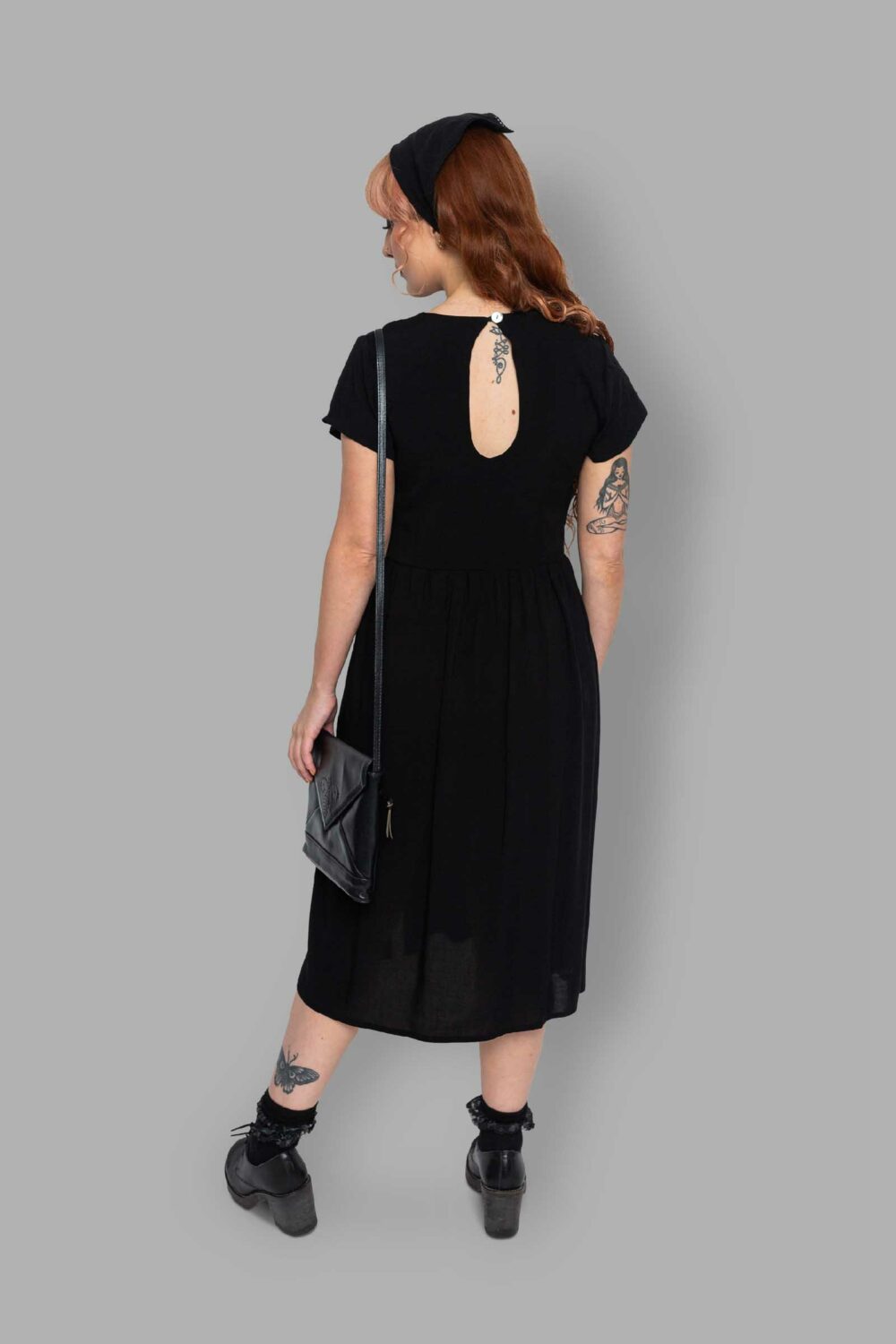 cosmic drifters black viscose slit thigh tea dress back