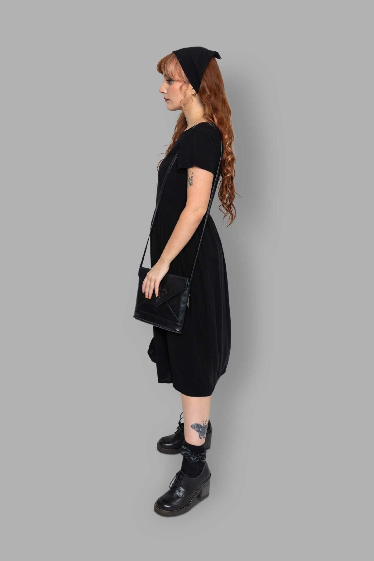 cosmic drifters black viscose slit thigh tea dress side