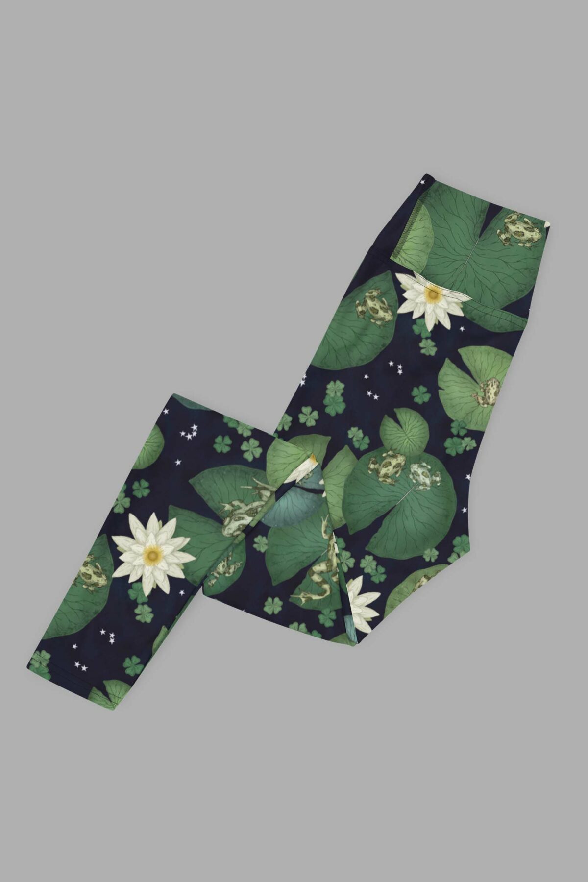 cosmic drifters lily pond print yoga leggings folded